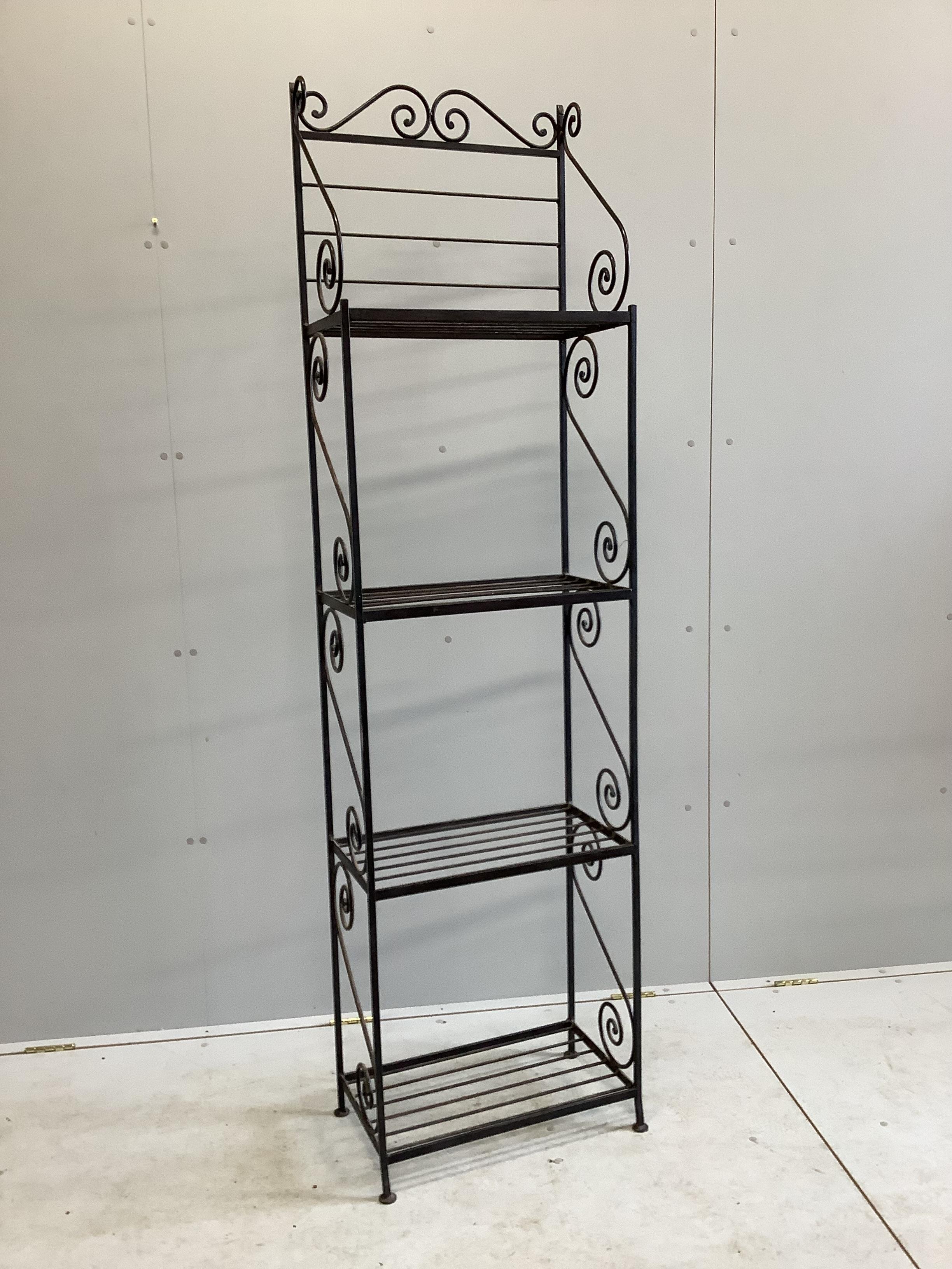 A wrought iron four tier baker's rack, width 53cm, depth 30cm, height 198cm